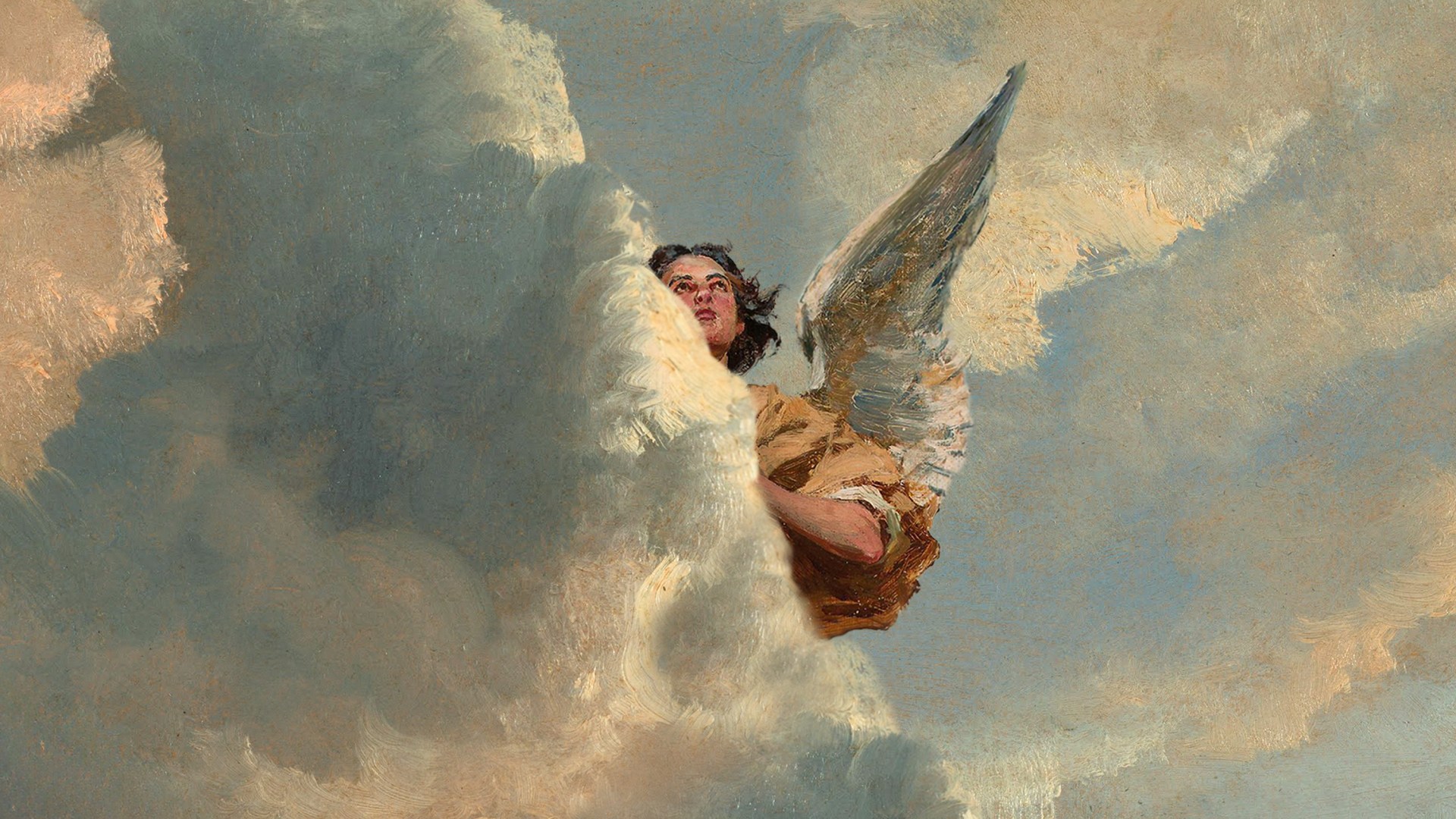 An angel peeking out from behind clouds.