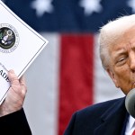 US President Donald Trump delivers remarks on reciprocal tariffs at the White House.