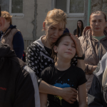 Ukrainian faces at the funeral of an evangelical family killed in Sumy by Russian airstrike