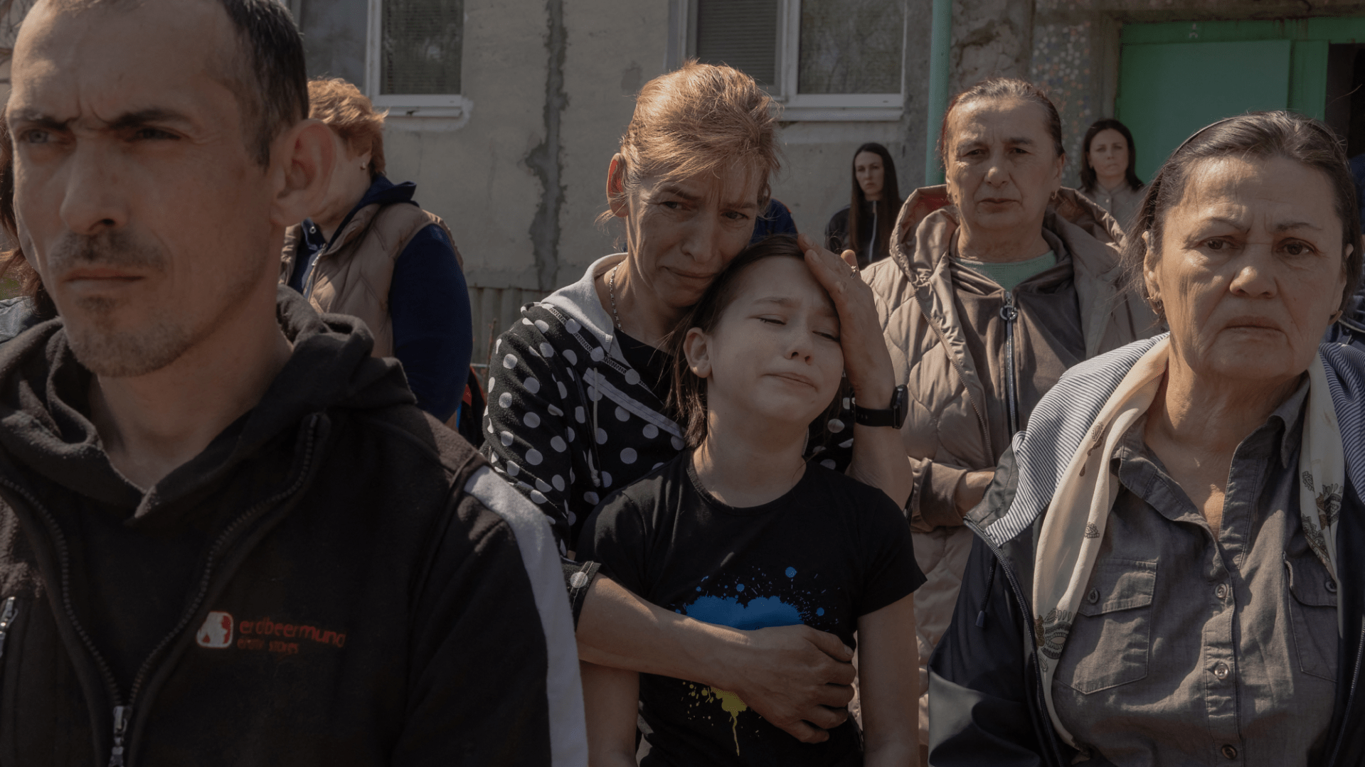 Ukrainian faces at the funeral of an evangelical family killed in Sumy by Russian airstrike