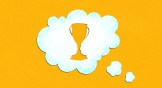 A thought bubble with the shape of a trophy cut out of it.