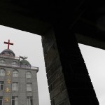 A man looking at the Lingbo Church in China.