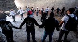 Members of Guerreros Buscadores pray at the Izaguirre Ranch where they located three human crematoriums while searching for their relatives in Mexico.