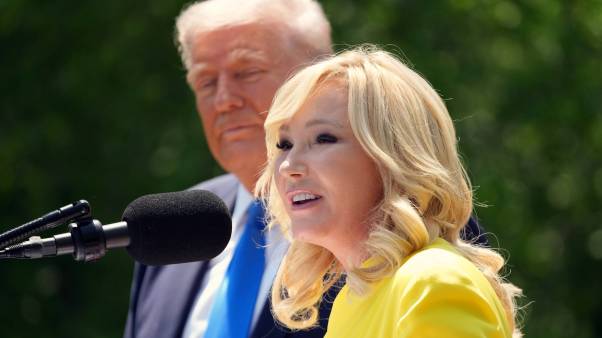 Paula White-Cain speaks at White House garden with Trump in background