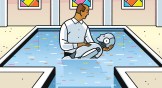 A pastor in a church baptizing a robot
