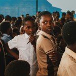 Nigerian children gathered in a building