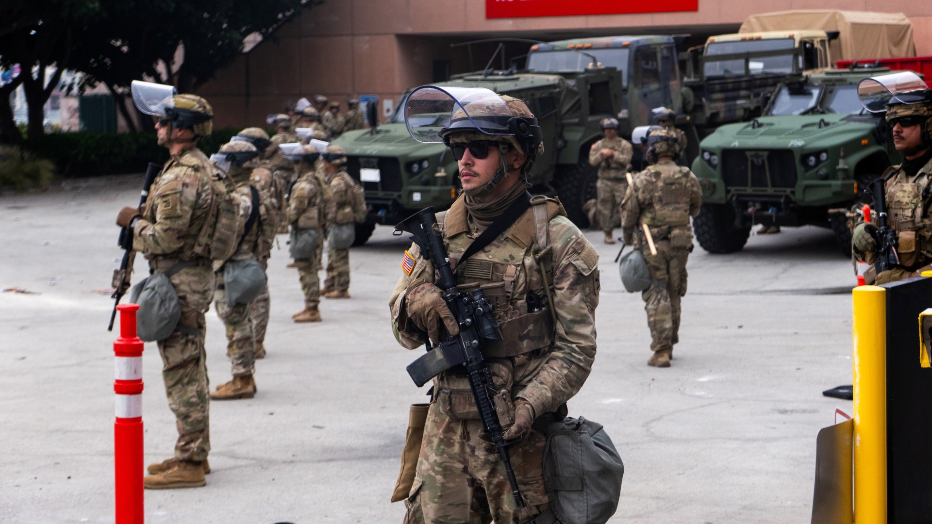National Guard troops stand outside the Metropolitan Detention Center in Los Angeles where some immigrants are being held.