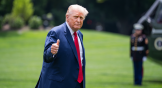 Donald Trump thumbs up walking