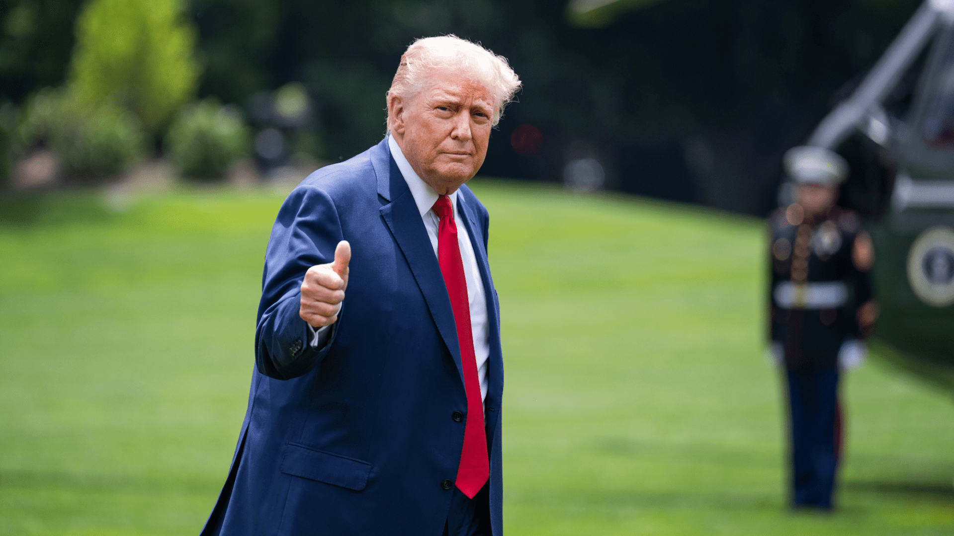 Donald Trump thumbs up walking