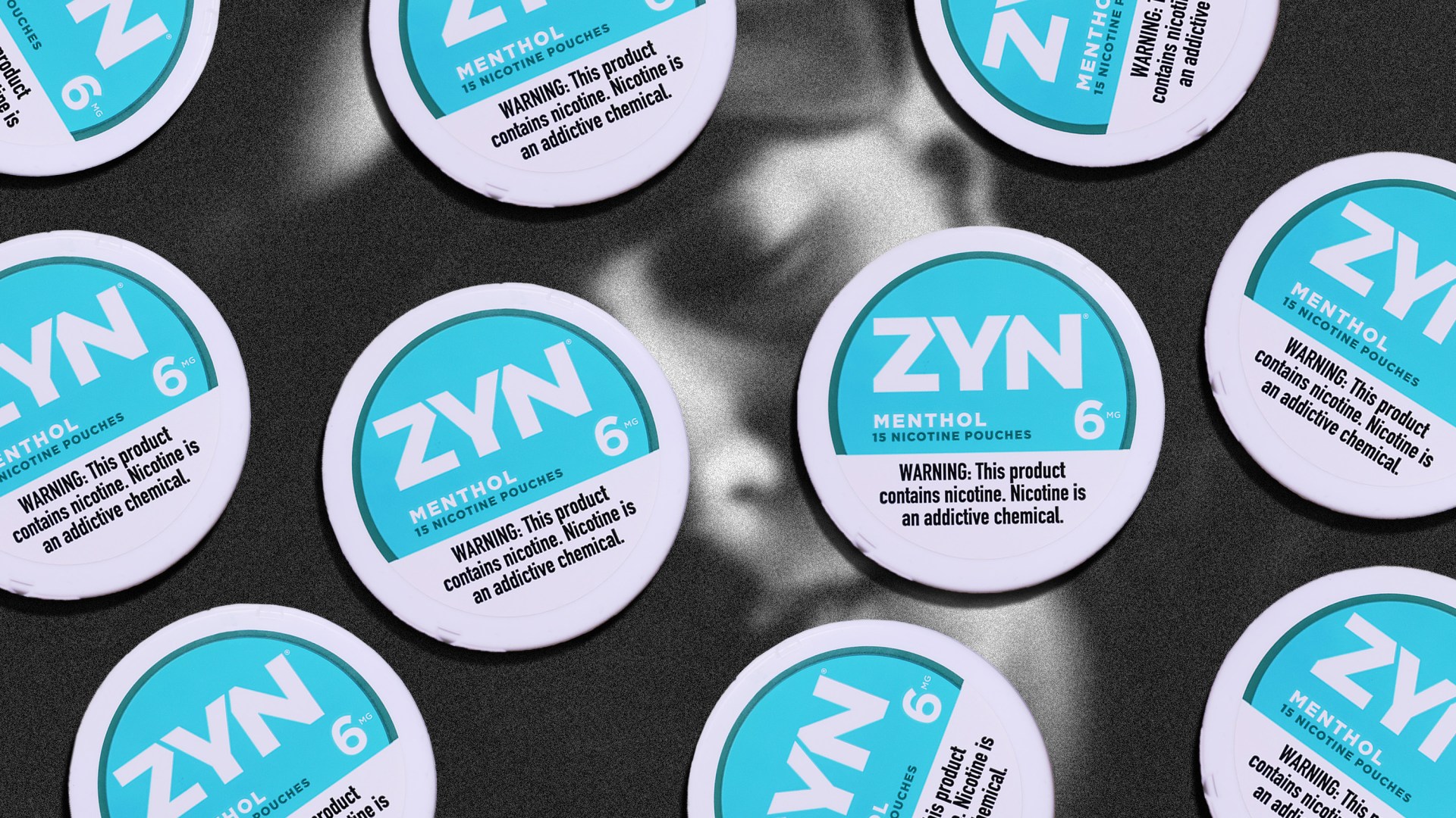 Several containers of Zyn sitting on top of a photo of a depressed young man.