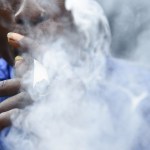 A man smokes marijuana in Lagos, Nigeria.