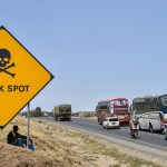 A road sign warns drivers of an accident-prone black spot on the busy Nakuru-Nairobi Highway in Kenya.