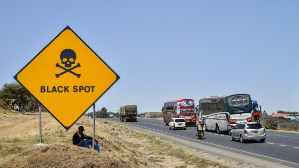 A road sign warns drivers of an accident-prone black spot on the busy Nakuru-Nairobi Highway in Kenya.