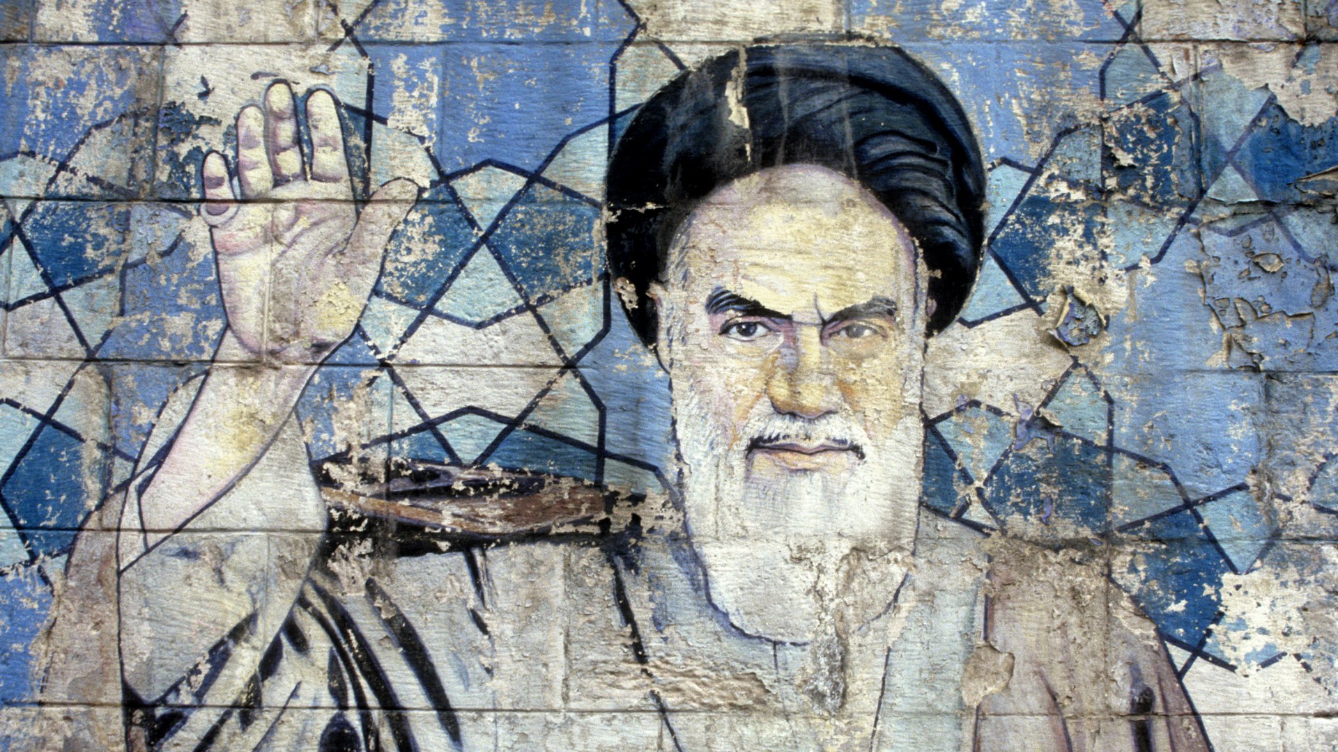 A mural on a street in Tehran depicting former head of state Ayatollah Khomeini.