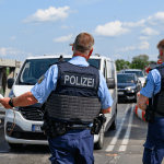 German police check cars for immigrants at the border