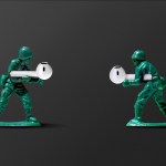 Two toy soldiers holding earbuds.