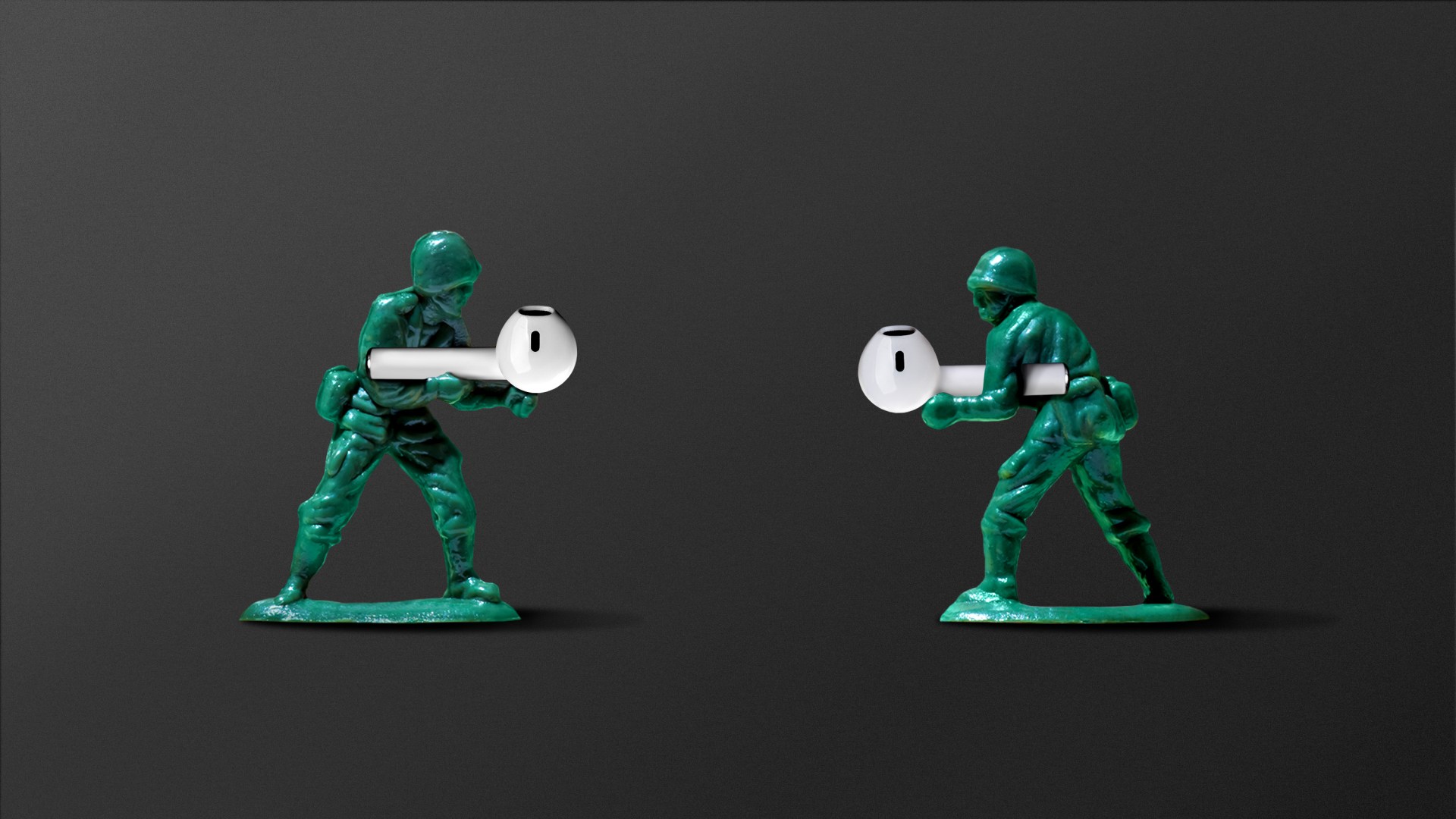 Two toy soldiers holding earbuds.
