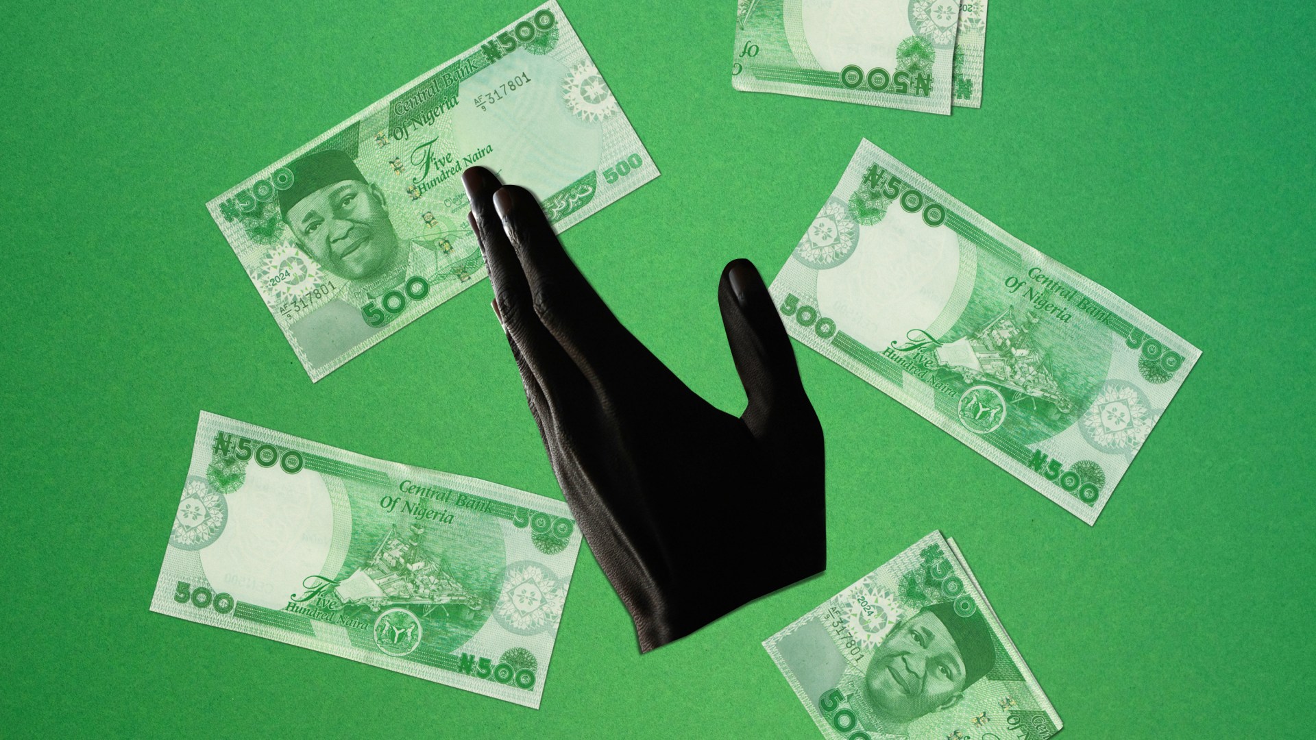 Hand raised with Nigerian currency behind it