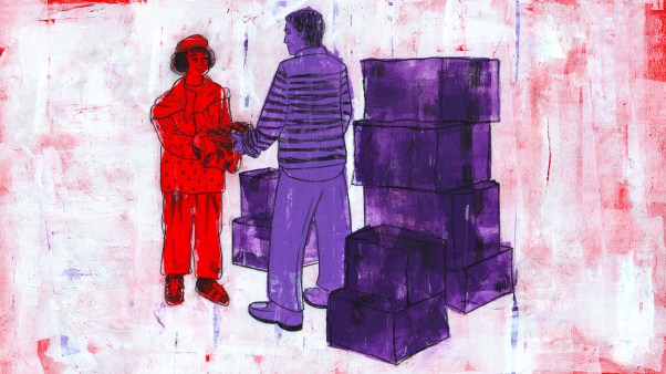A woman welcoming a man who has just moved
