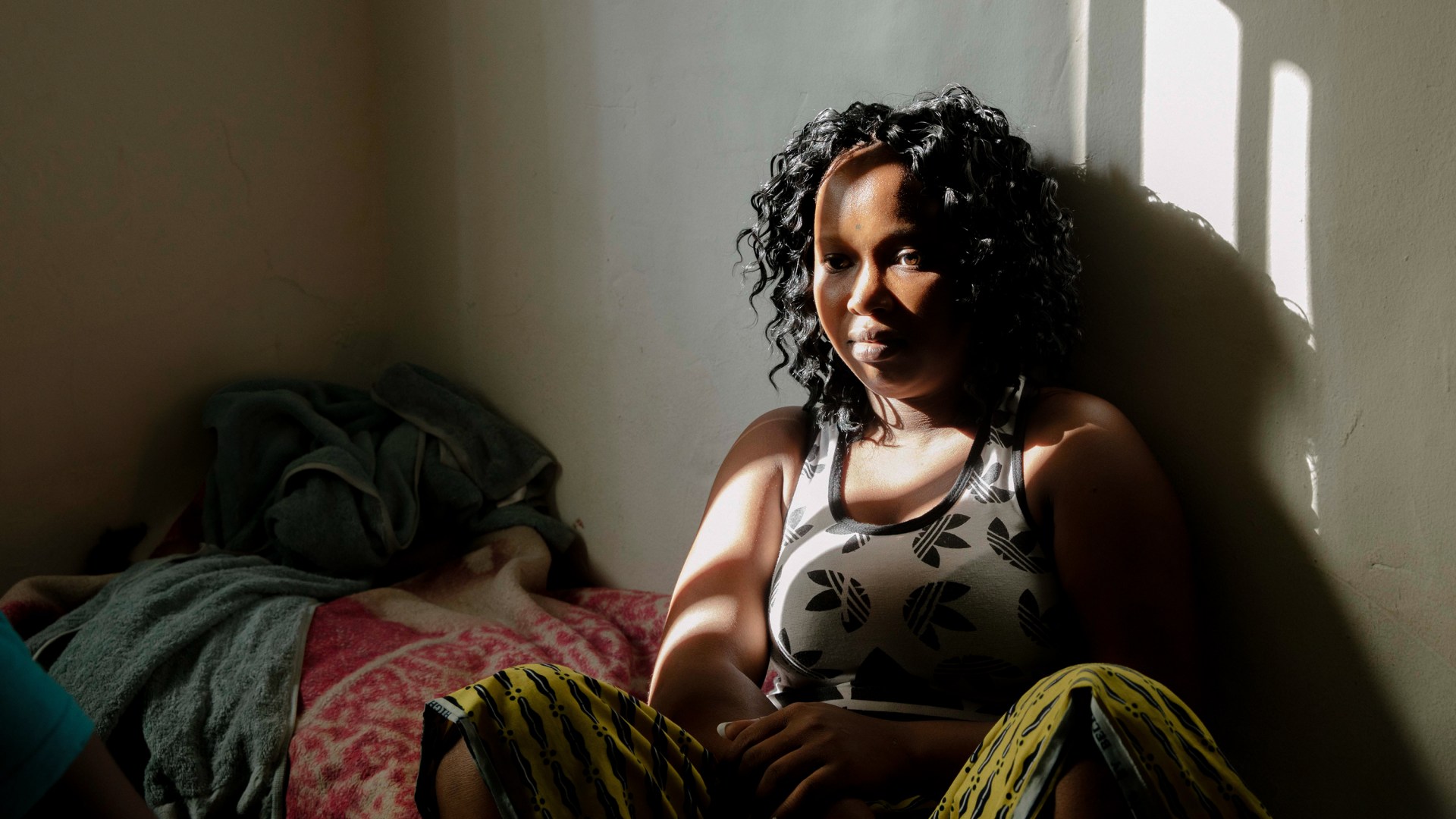 A woman from Africa who was trafficked into working at a private household.