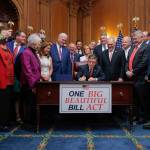 House Speaker Mike Johnson signs the one big beautiful bill act.