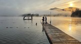 Campers stand on the pier at the Christian summer camp, Deerfoot.
