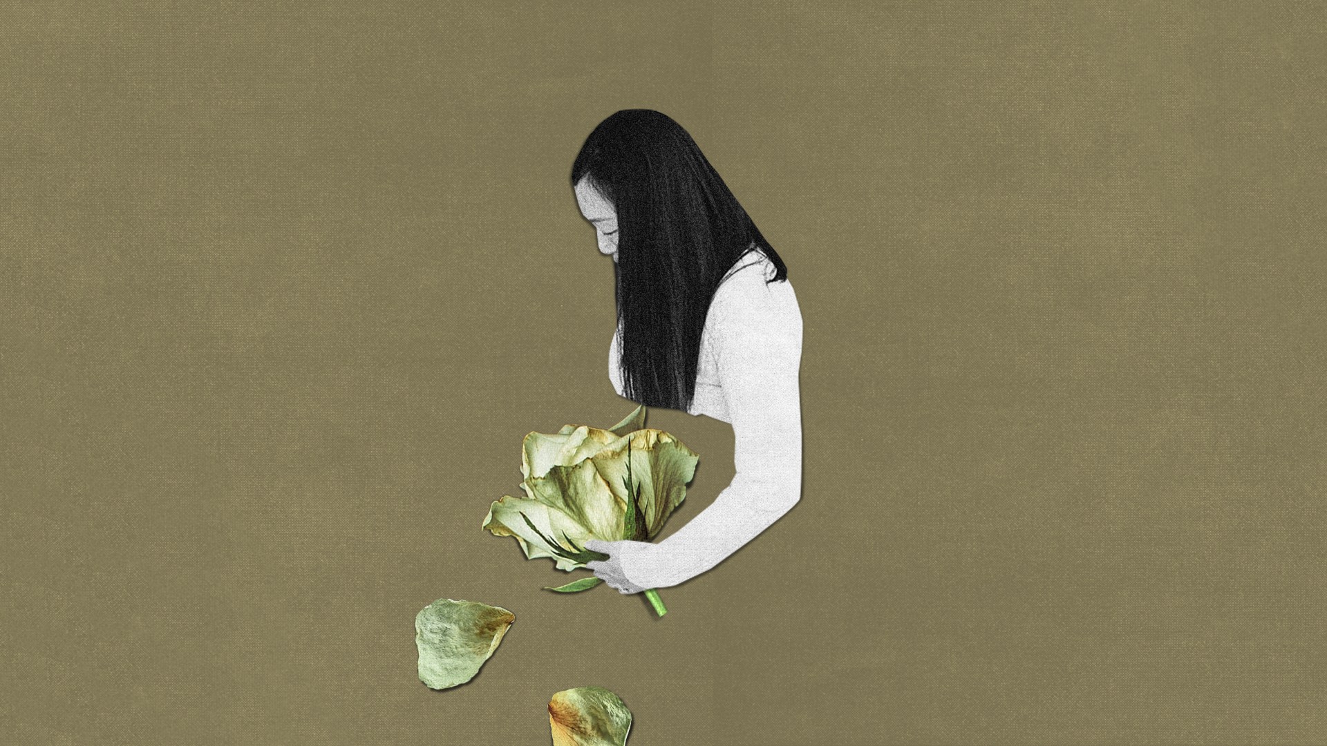 A woman with a rose and petals