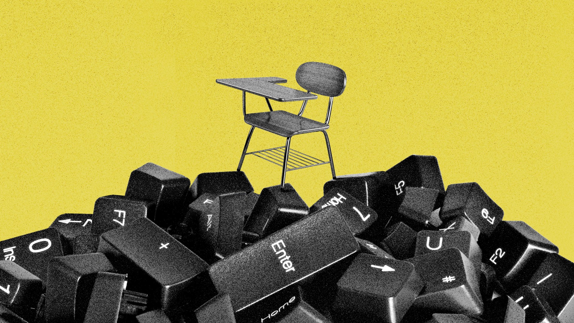 A school desk on top of computer keys from a keyboard