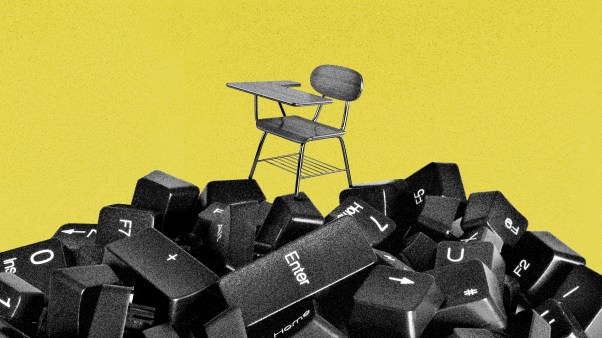A school desk on top of computer keys from a keyboard