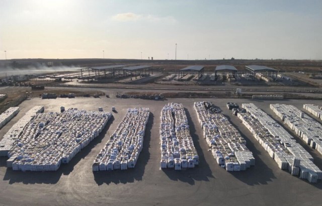 The large amounts of food aid that the UN had sitting outside Gaza.