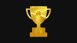 A gold trophy with Jesus inside.