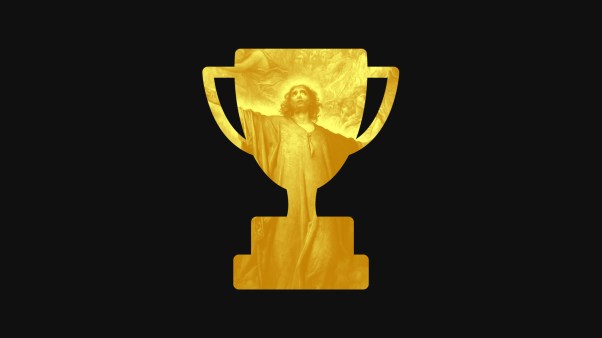 A gold trophy with Jesus inside.
