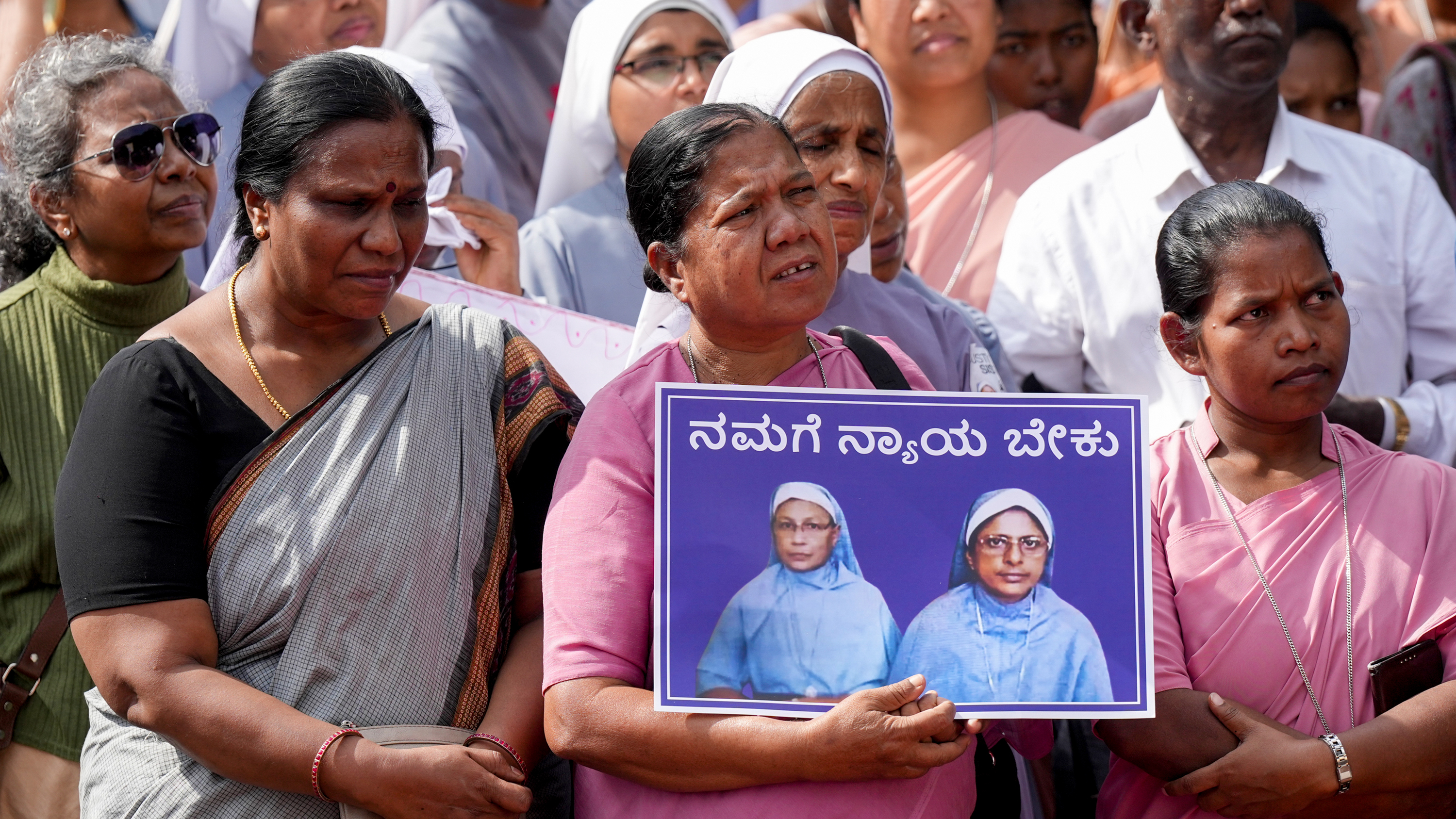 2 nuns being searched by police video