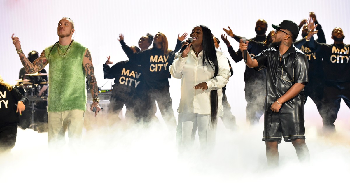 From left to right: Brandon Lake, Naomi Raine, and Chandler Moore of Maverick City Music perform onstage in Los Angeles, California.
