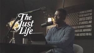 A photo of Benjamin Watson at mic with the title of the podcast The Just Life overlaid on the image