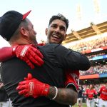 Brayan Rocchio #4 and manager Stephen Vogt #12 of the Cleveland Guardians celebrates Rocchio's walk off three-run home run to defeat the Texas Rangers 9-8 in ten innings.