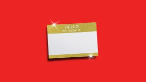 A sparkling gold name tag