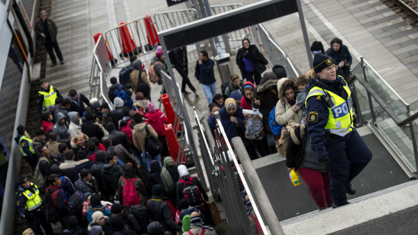 Asylum seekers arrive in Sweden.