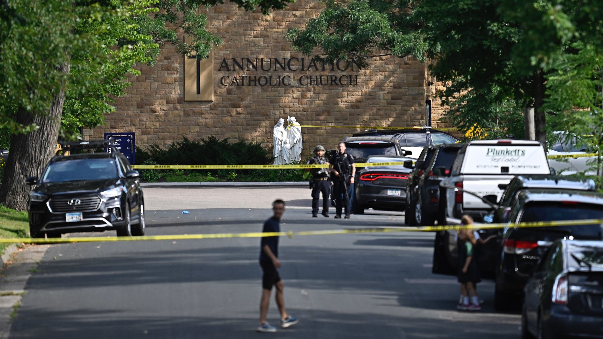 Police work the scene following a mass shooting at Annunciation Catholic School on August 27, 2025 in Minneapolis, Minnesota.