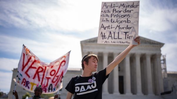 Pro-life sign held before court