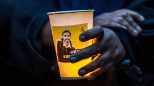 Activists attend a candlelight vigil to protest the impending execution of Pannir Selvam Pranthaman.