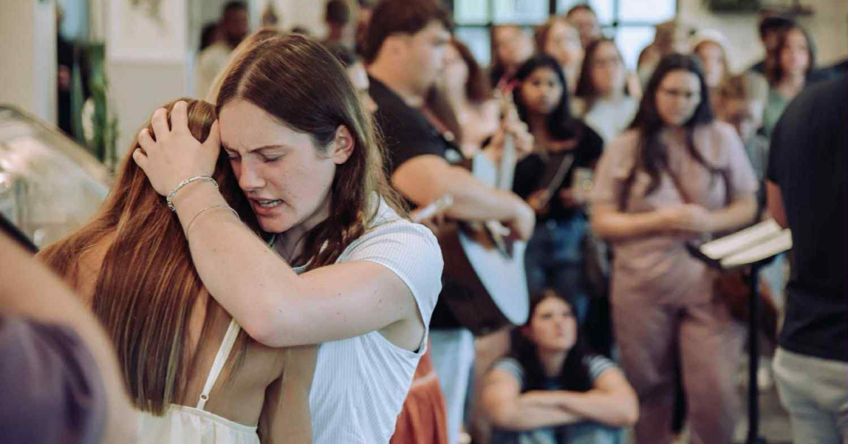 Young people praying worshiping Elizabethton TN