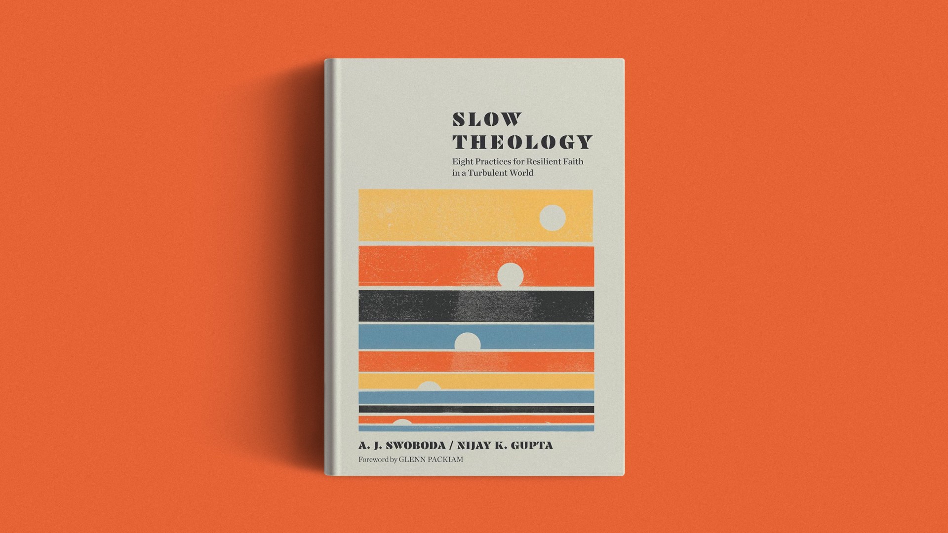 The book cover on an orange background.