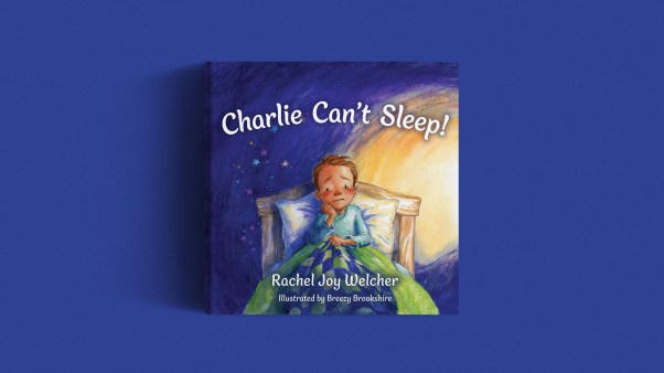 The book cover on a purple background.