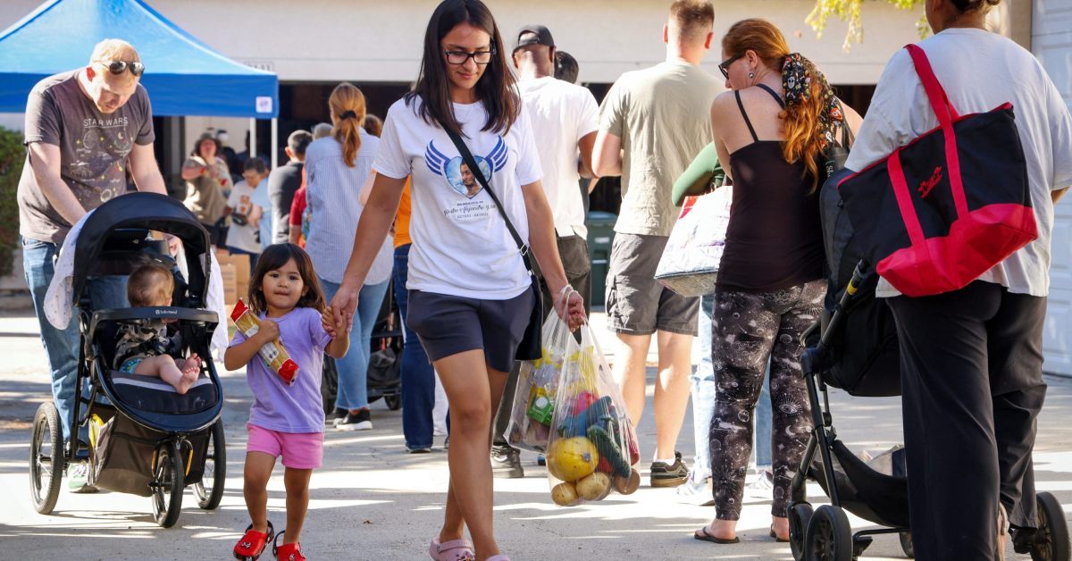 Military families receive free food from a food bank