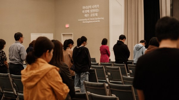 Parishioners attend Sunday service at New Life Baptist Church of Atlanta.