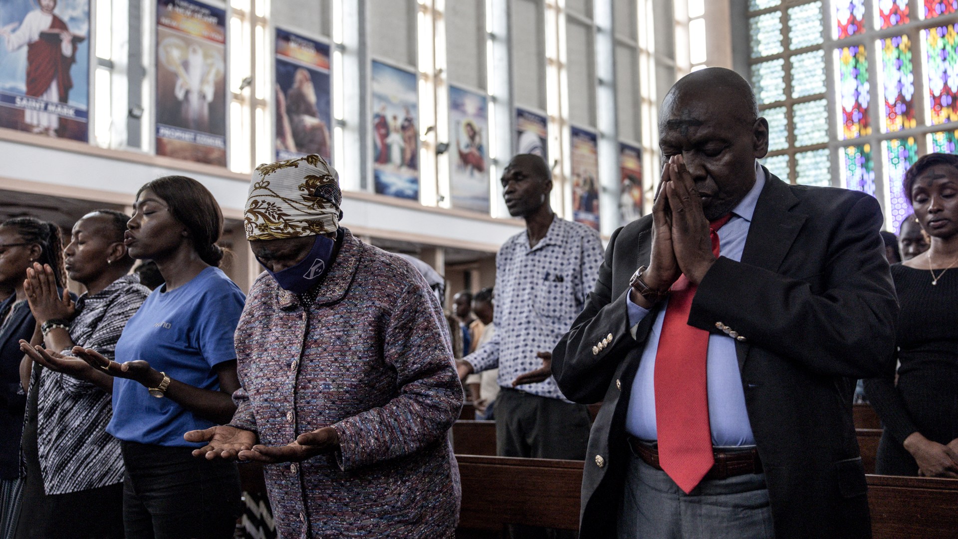 People praying in church.