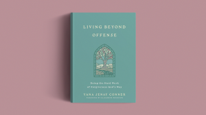 The book cover on a pink background.