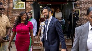 attends a church service at the Alliance Tabernacle Church.