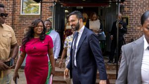 attends a church service at the Alliance Tabernacle Church.